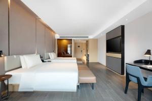 Μια τηλεόραση ή/και κέντρο ψυχαγωγίας στο Atour Hotel Xi'an Chanba Exhibition Center Expo Park