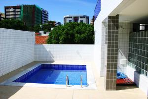 Bazén v ubytovaní Apartamento Completo alebo v jeho blízkosti