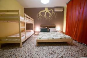 Postel nebo postele na pokoji v ubytování Ai 4 Elementi
