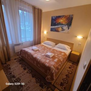 En eller flere senge i et værelse på The Castle Bonko