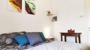 Säng eller sängar i ett rum på Casa Modigliani - Tra Arte e Natura