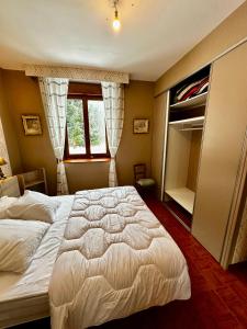 Krevet ili kreveti u jedinici u objektu Maison 9pers Le Mont Dore