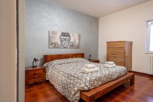 Katil atau katil-katil dalam bilik di Villa Torre Leporano a due passi dal mare