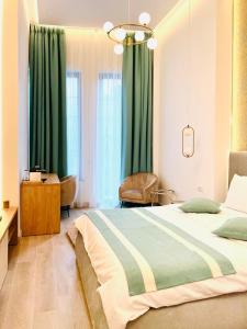 Postel nebo postele na pokoji v ubytování House4You - Blanari