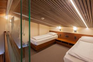 Postel nebo postele na pokoji v ubytování Boutique Hotel die Mittagspitze Superior