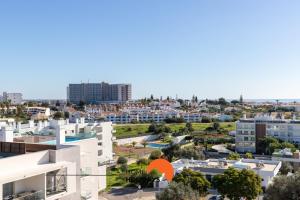 an aerial view of a city with buildings at #200 Panoramic Flat by Home Holidays in Vale de Pedras