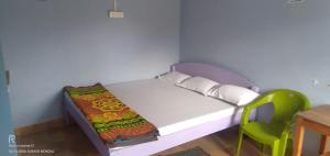 Säng eller sängar i ett rum på Hotel UK Nest