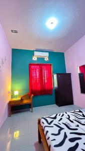 Postel nebo postele na pokoji v ubytování Twentynine Homestay