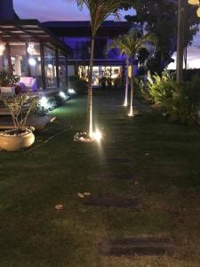 Jardín al aire libre en Casa Praia - Toquinho, Piscina, Área de Laser.