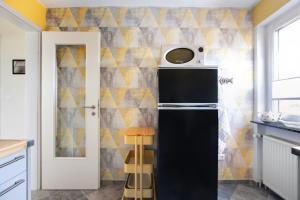 Kuchyň nebo kuchyňský kout v ubytování Ferienwohnung Nordmeer