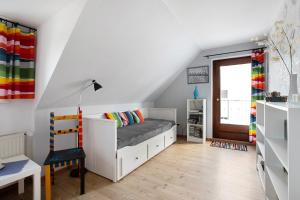 Postel nebo postele na pokoji v ubytování Ferienwohnung Nordmeer