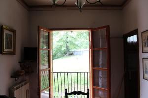 TV a/nebo společenská místnost v ubytování La casa di Minù