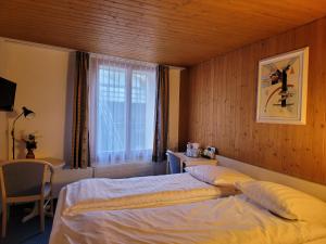 Voodi või voodid majutusasutuse Dinh Residence toas