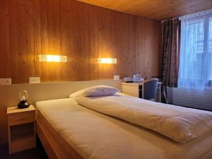 Voodi või voodid majutusasutuse Dinh Residence toas
