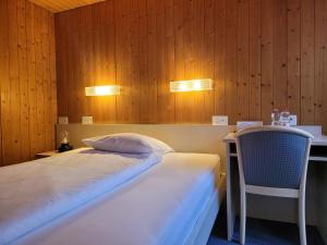 Voodi või voodid majutusasutuse Dinh Residence toas