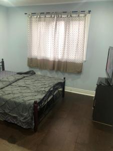 Posteľ alebo postele v izbe v ubytovaní ShayCozyDelux-Room-202