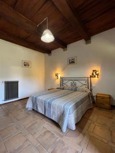 Katil atau katil-katil dalam bilik di B&B Podere Legnotorto
