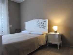 A bed or beds in a room at Il Rifugio dei Briganti