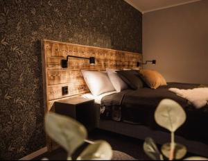 Postel nebo postele na pokoji v ubytování Hotellet i Jörn AB
