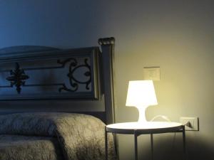A bed or beds in a room at Il Rifugio dei Briganti