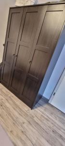 a wooden door in a room with a wooden floor at Ferienwohnung Sigmarino in Sigmaringen