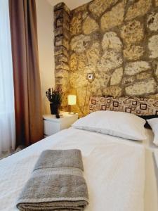 Posteľ alebo postele v izbe v ubytovaní Balaton Apartman Füred