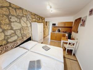 Kuchyňa alebo kuchynka v ubytovaní Balaton Apartman Füred