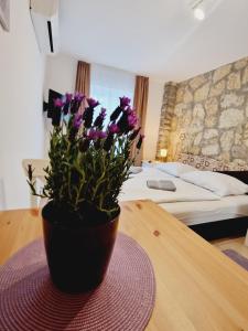Posteľ alebo postele v izbe v ubytovaní Balaton Apartman Füred