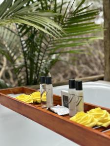 a tray with four bottles of sunscreen on a table at SABI Escapes in Mochudi