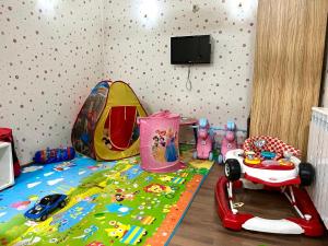 TV a/nebo společenská místnost v ubytování Suite in Dream Bansko
