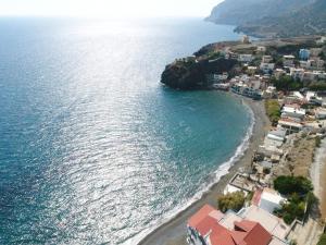 an aerial view of a beach and the ocean at House with view sound of waves in Paránimfoi