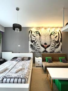 Postel nebo postele na pokoji v ubytování White Tiger in New Gudauri II