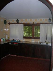 Kuchyň nebo kuchyňský kout v ubytování Tunquelen