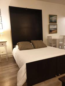Ένα ή περισσότερα κρεβάτια σε δωμάτιο στο Villa Ariane