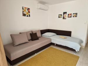 Posteľ alebo postele v izbe v ubytovaní Balaton Apartman Füred