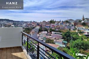a balcony with a view of a city at HANZ Hoa Dang Hotel in Da Lat