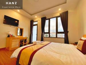 Postel nebo postele na pokoji v ubytování S481 Hoa Dang Hotel Dalat