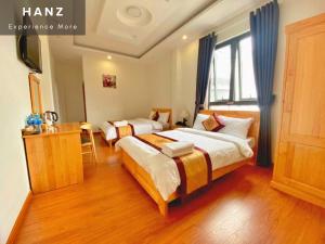 Postel nebo postele na pokoji v ubytování S481 Hoa Dang Hotel Dalat