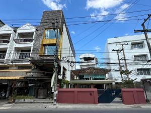 a building on the side of a street at One More Space in Chiang Mai