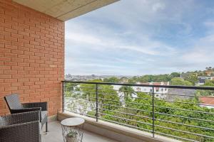 a balcony with a view of the city at 601 at 2SIX2 Florida Road by HostAgents in Durban