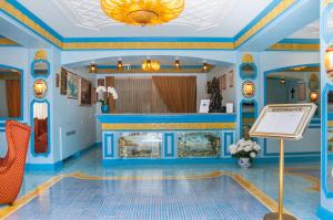 TV a/nebo společenská místnost v ubytování Hotel Eliseo Park's