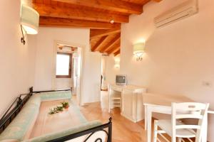 Ein Bett oder Betten in einem Zimmer der Unterkunft Residence with swimming-pool in Vignola Mare
