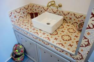 a bathroom counter with a sink on top of it at What a View ! On the top of the Castle / Kasbah. in Tangier