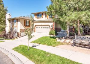 a house with a bench in front of it at Union Cove 3-Plex in Salt Lake with Hot Tub in Midvale
