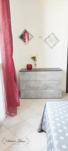 Ένα ή περισσότερα κρεβάτια σε δωμάτιο στο SALENTO GLAM HOUSE +48 φωτογραφίες