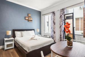 Postel nebo postele na pokoji v ubytování Lovely condo in Miami Beach