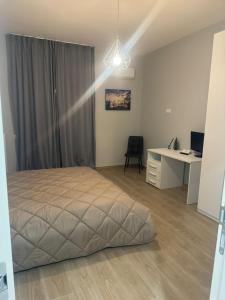 Een bed of bedden in een kamer bij La casa di Angy