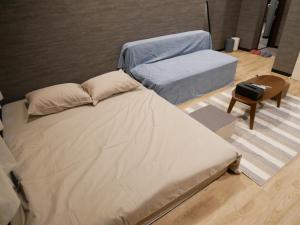 Ein Bett oder Betten in einem Zimmer der Unterkunft HOOD - Vacation STAY 46330v