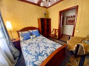 Cama o camas de una habitación en Уютный дом в предгорьях Алматы