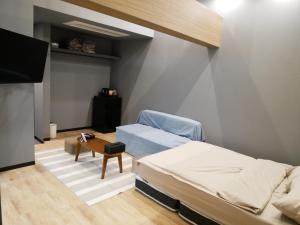 Ένα ή περισσότερα κρεβάτια σε δωμάτιο στο HOOD - Vacation STAY 46324v